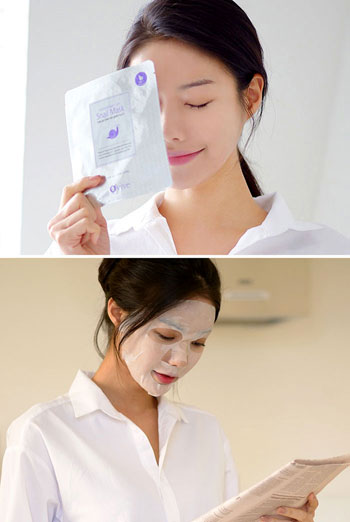 A model puts on a face mask that contains ingredients extracted from snails. Customers love skincare face masks as they see them as an easy and economical way to care for their skin.