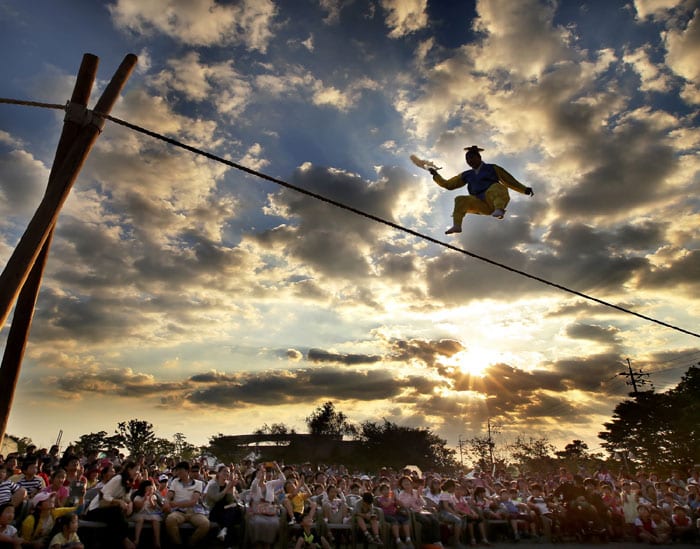 A photo of a tightrope walker is also one of the bronze prize winners.