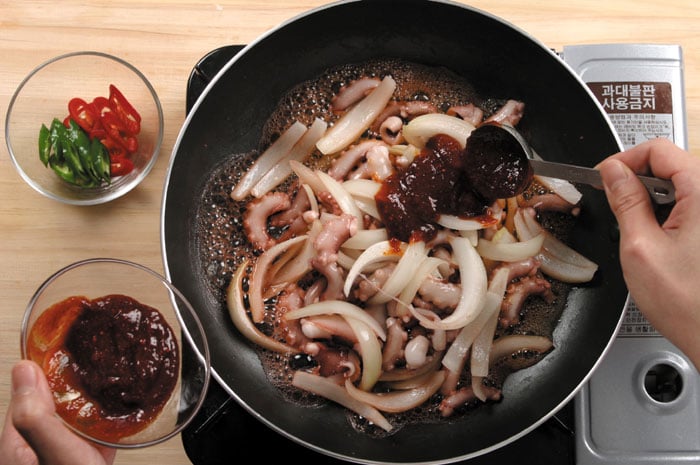 Carrots and other vegetables can be added, depending on taste. Quick frying the veggies on high will give the final dish better color and it will be a bit less watery.