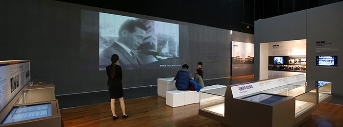 On March 3, a family visiting the Presidential Archives watches a video of a speech by former President Park Chung-hee.