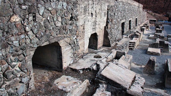 The foundation stones for machines used in the dressing plant, where ore was once mined and sorted, still remain, even though the mine closed in 1972.