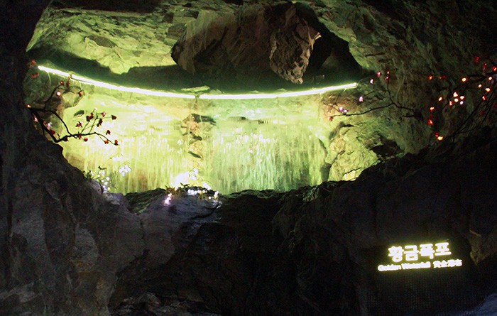 A natural spring inside the Gwangmyeong Cave provides water for its artificial waterfall.