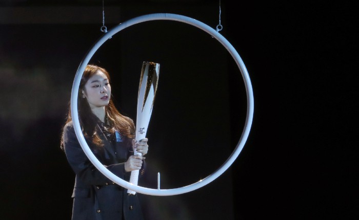 Honorary Ambassador Kim Yuna of the PyeongChang 2018 Olympic and Paralympic Winter Games unveils the official Olympic torch during the ‘One Year to Go Ceremony’ in Gangneung, Gangwon-do Province, on Feb. 9.