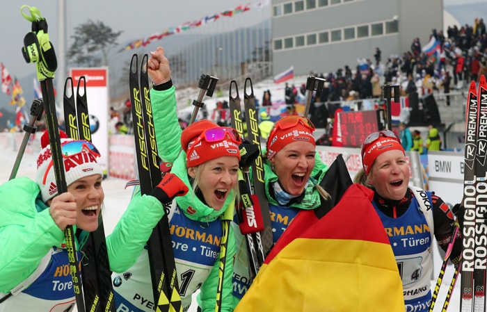 The German team smiles with joy after winning the women’s relay in the IBU Biathlon World Cup, at the Alpensia Biathlon Center in Pyeongchang, Gangwon-do Province, on March 5.