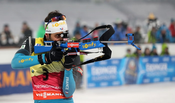 French biathlete Martin Fourcade shoots in the standing position during a men’s 12.5 km pursuit event in the IBU Biathlon World Cup at the Alpensia Biathlon Center in Pyeongchang, Gangwon-do Province, on March 4.