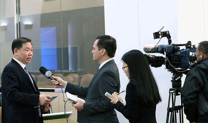 Yang YounGye (left) from Seoul’s Transportation Information Center is interviewed by the SBT reporter Marcelo Torres in Seoul on April 13.