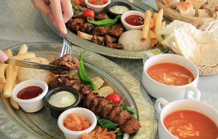 Lamb shish kebab (top) and Adana kebab are both signature menu items at Kervan, a halal Turkish restaurant certified by the Korea Muslim Federation.