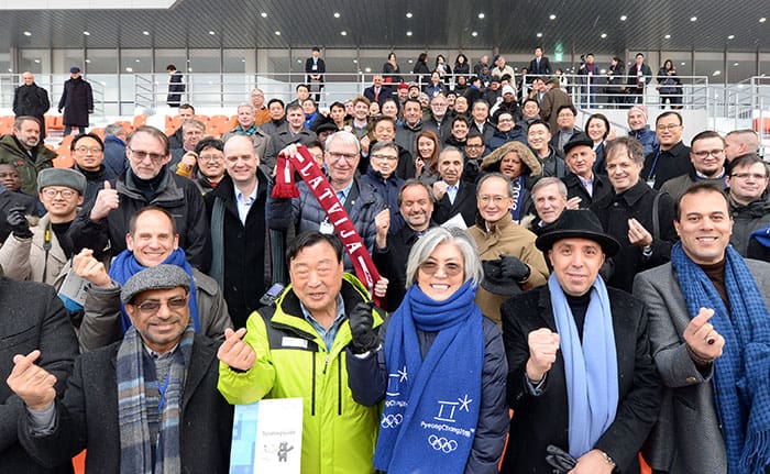 Foreign Minister Kang Kyung-wha and ambassadors and businessmen from 68 nations pose for a photo during their visit to PyeongChang Olympic Stadium on Nov. 25, where the opening ceremony of the PyeongChang 2018 Olympic and Paralympic Winter Games will be held. (Ministry of Foreign Affairs)