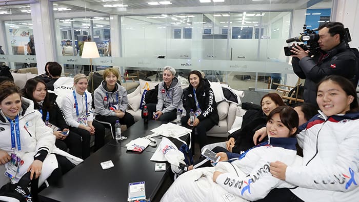 Sarah Murray, coach of the unified women's ice hockey team, and the team itself that embodied the ’Peace Olympics’ has a chat with big smiles on their faces during the Olympic Team Night for the Korean national athletes at the PyeongChang 2018 Olympic Winter Games, held at Team Korea House at the Gangneung Olympic Park, Gangwon-do, on Feb. 24.