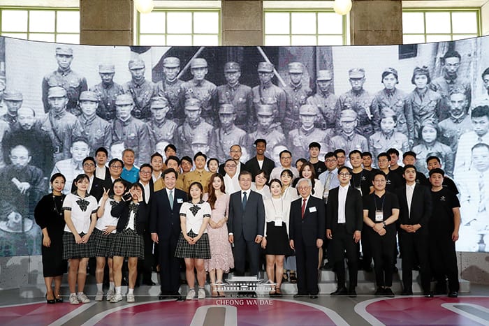 On July 3, President Moon Jae-in poses for a photo with attendees who participated in the launch ceremony for a preparatory committee that will manage events to commemorate the 100th anniversary of the March First Independence Movement and the establishment of the Korean provisional government next year. The ceremony was held at the Culture Station Seoul 284 in Jung-gu District, Seoul.