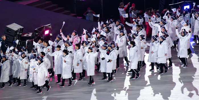 Inter-Korean athletes march together under one flag during the Opening Ceremony of the PyeongChang 2018 Olympic Winter Games, at the PyeongChang Olympic Stadium on Feb. 9. (Hyoja-dong Studio)