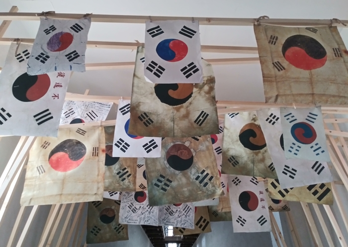 Shown here are flags used by Korean independence activists at Seodaemun Prison History Hall in Seoul. An exhibition there will run through April 21 to mark the centennial anniversary of the March First Independence Movement and the establishment of the Korean Provisional Government in China.