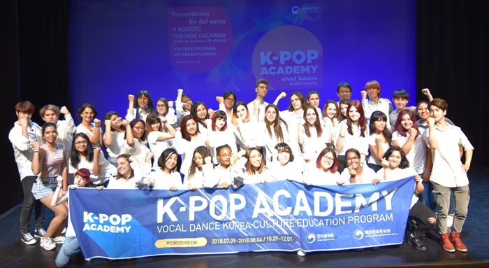 Participants gather after their performance in the 2018 K-pop Academy at the Korean Cultural Center in Madrid, Spain.