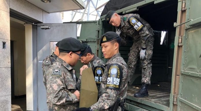 Both Koreas finish disarming JSA