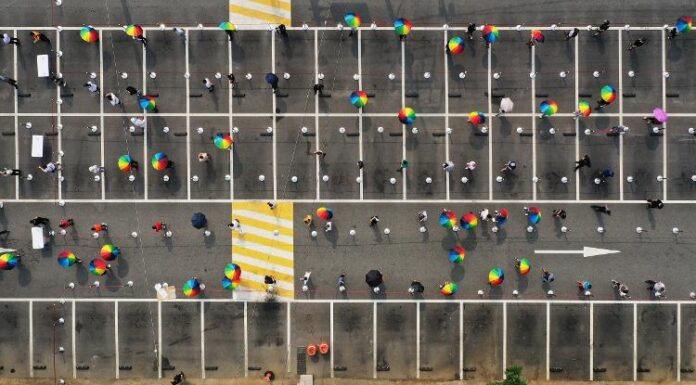 Gov’t urges long-term expats to get vaccinated vs. COVID-19